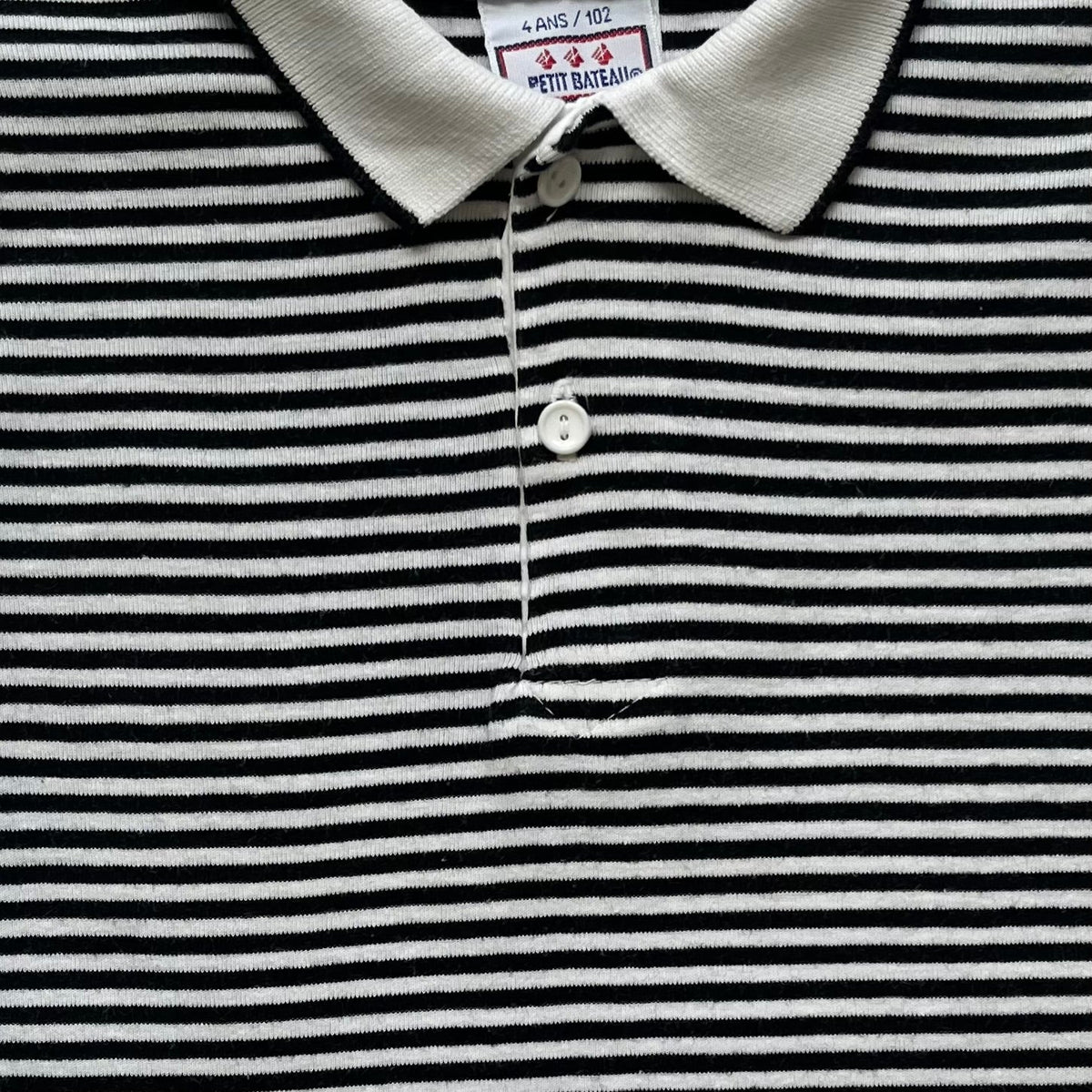 4A - Polo à rayures sans manches